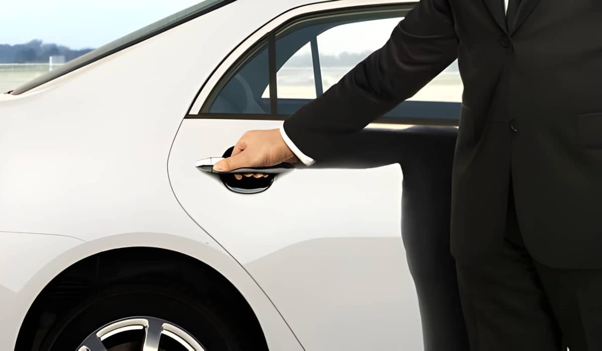 driver opening car door for pick and drop service UAE